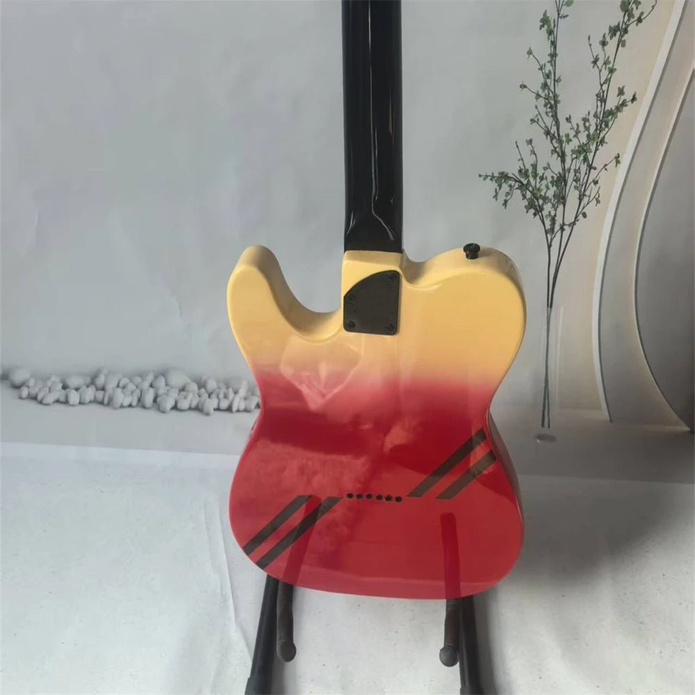 High-quality six-string electric guitar, with a two-tone body, rosewood fretboard, black hardware