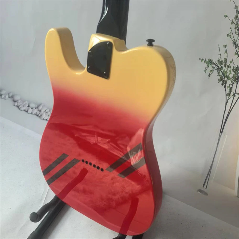 High-quality six-string electric guitar, with a two-tone body, rosewood fretboard, black hardware